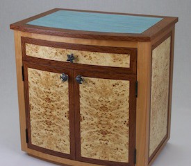 Bow front veneer chest